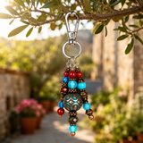 southwest purse charm dangling in garden