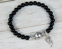 black bead bracelet for women with angel wing charm