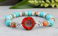 Blue and Orange Beaded Hippie Bracelet with Flower Focal Bead