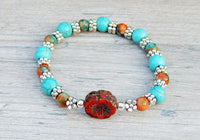 Blue and Orange Beaded Hippie Bracelet with Flower Focal Bead