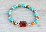 Blue and Orange Beaded Hippie Bracelet with Flower Focal Bead