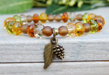 fall bracelet with leaf and pine cone charms