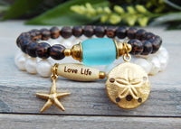 ocean bracelets starfish sand dollar pearls palm wood sea glass