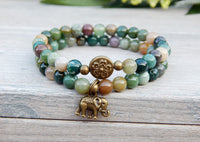 gemstone beaded bracelet with ganesha charm