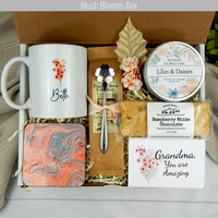 Warm wishes for Grandma: Gift basket for her with a personalized name mug, candle, comforting biscotti, and coffee.