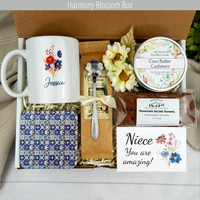 Celebrate special moments: Personalized name mug, coffee, goodies, engraved spoon, and candle in a care package for your niece.