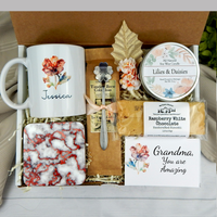 Grandma's special treat: Gift box with custom name mug, candle, engraved spoon, biscotti, and coffee to show your appreciation.