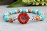Blue and Orange Beaded Hippie Bracelet with Flower Focal Bead
