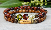 journey bracelet stacked with gemstones and wood