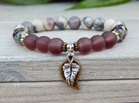 purple gemstone bracelet with leaf charms