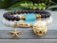 ocean inspired freshwater pearl and palm wood bracelet
