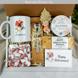 Coffee and Relaxation: Women's retirement care package filled with gourmet coffee, a customized name mug, thoughtful treats, engraved spoon, and candle.