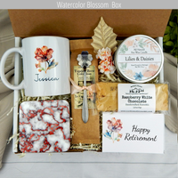 Retirement gift basket filled with coffee, a customized mug, and thoughtful goodies to encourage her retirement journey.