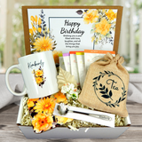 yellow flower themed birthday gift basket with tea and personalized mug