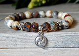 gemstone bracelet with yin yang charm